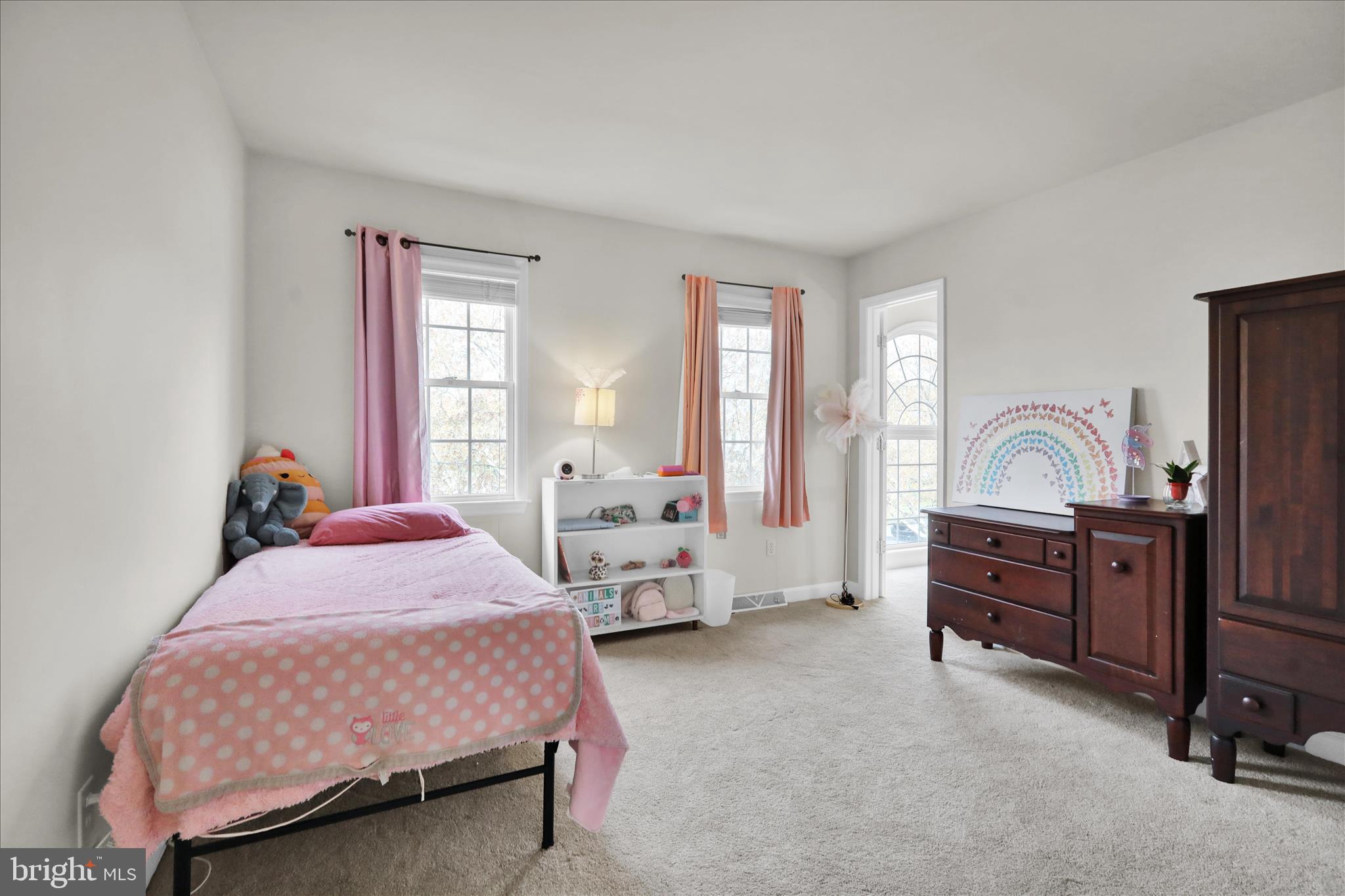 18 Colorado Avenue Reading, PA 19608 - Photo 29 of 37 a bedroom with a bed and dresser with mirror