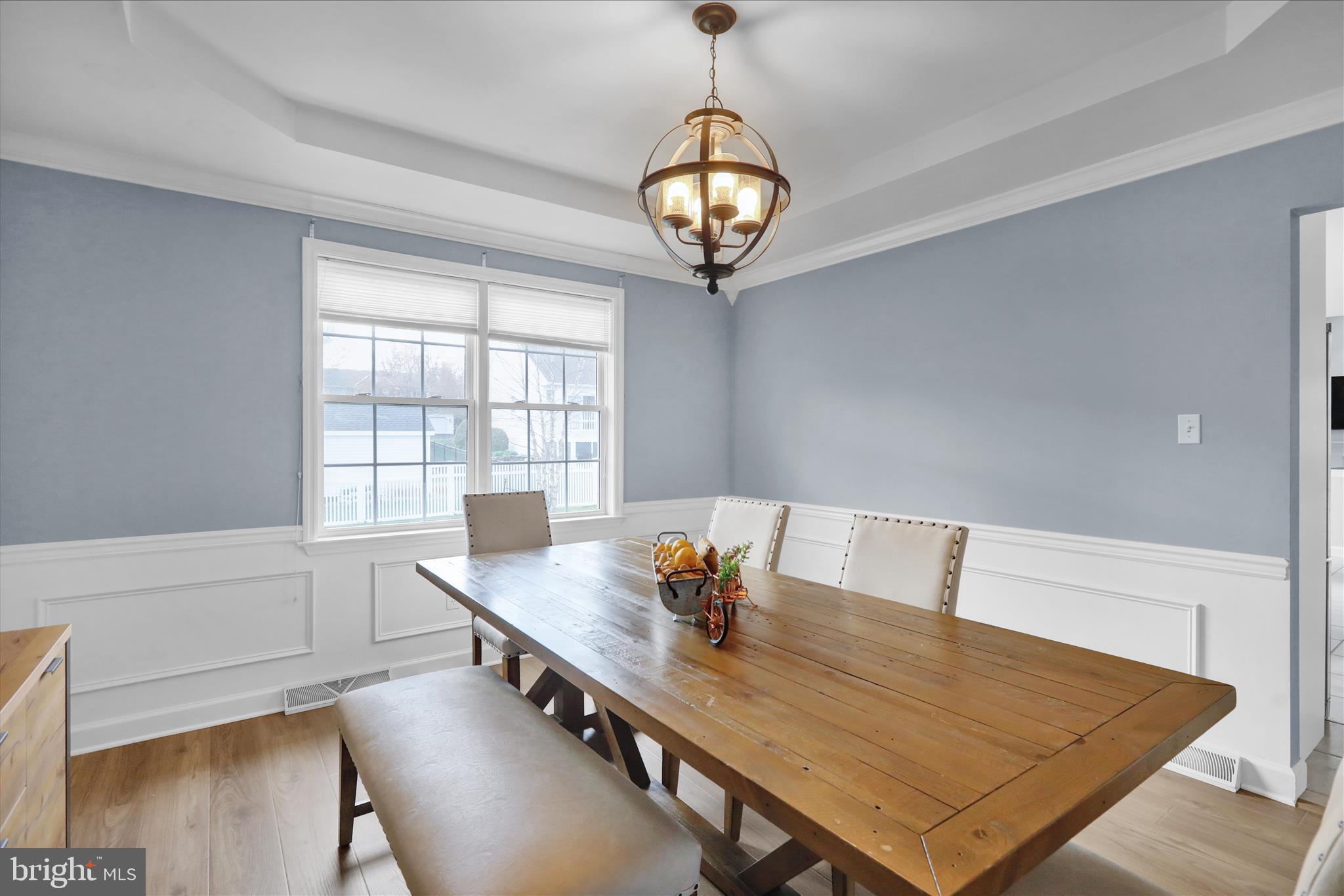 18 Colorado Avenue Reading, PA 19608 - Photo 6 of 37 a view of a dining room with furniture window and wooden floor