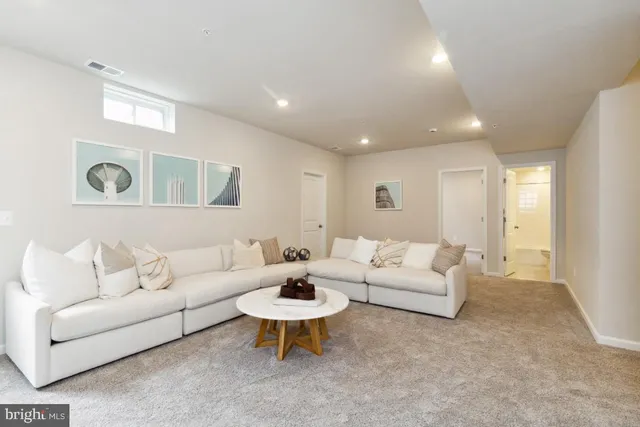 a living room with furniture and a couch