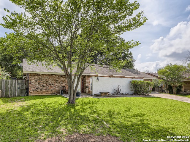 14103 Forum Road Universal City, TX 78148 - Photo 1 of 1 a view of house with backyard