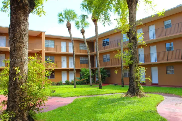a car parked in front of a house