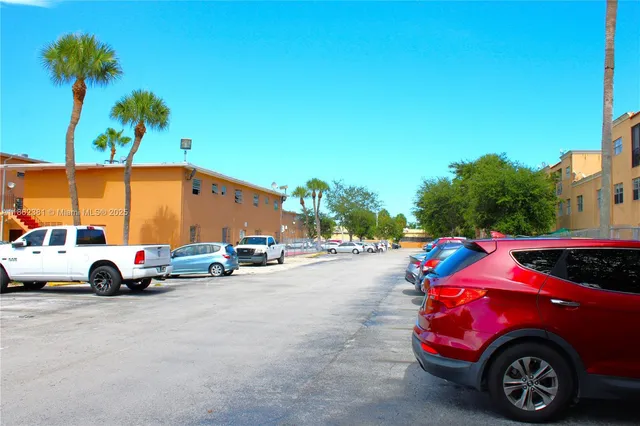 a view of front of house with a yard