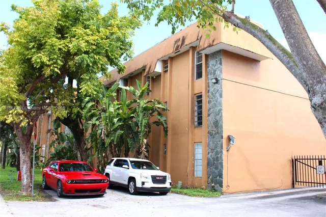 a car parked in front of a house