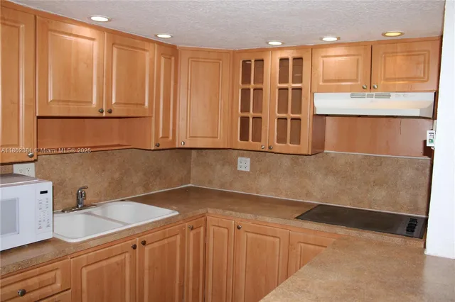 a view of swimming pool with a yard