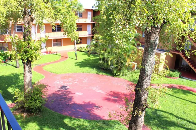a close view of a utility room with dryer and washer