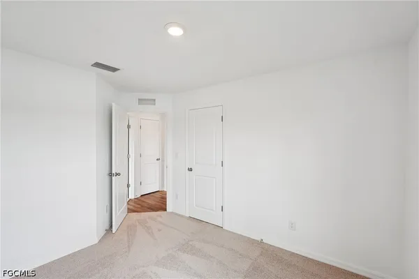 a view of a lake with a big yard