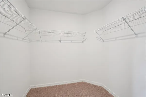 an aerial view of a house with a lake view