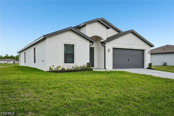 a view of room with window and hardwood floor