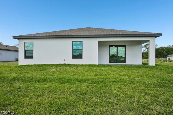 a front view of house with yard