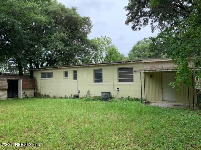 2619 Bywood Road Jacksonville, FL 32211 - Photo 12 of 13 a view of a house with a yard
