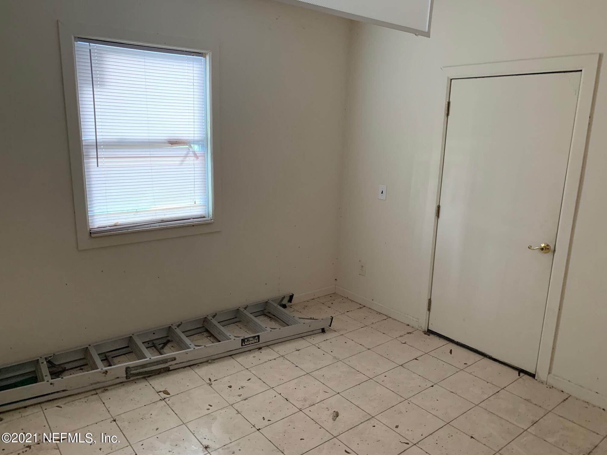2619 Bywood Road Jacksonville, FL 32211 - Photo 4 of 13 a view of a room that has a window in it