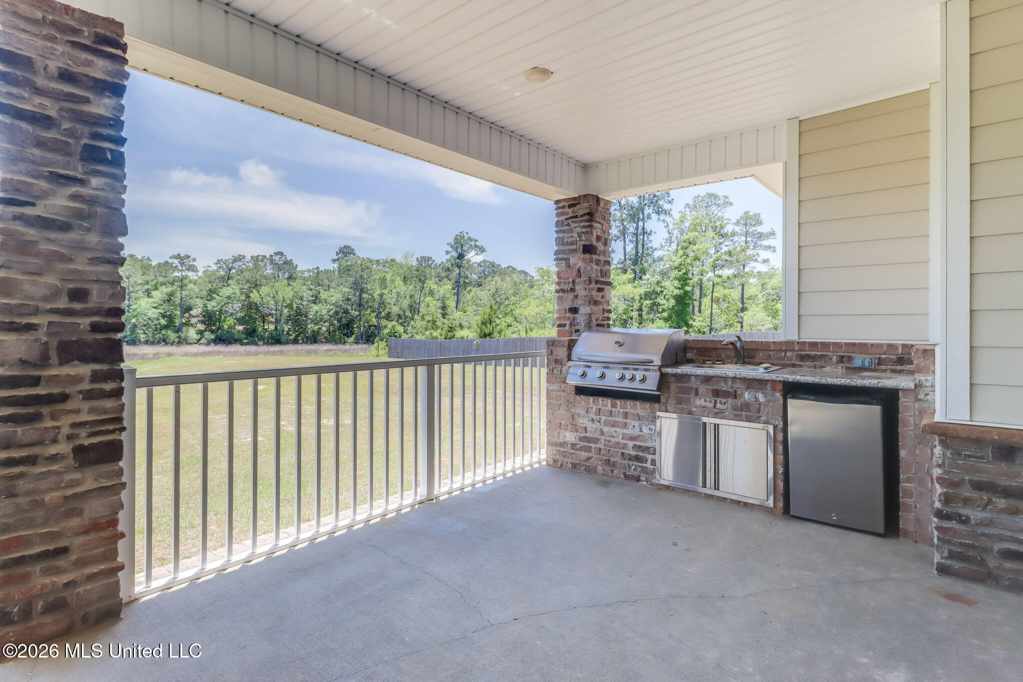 5894 Windmill Street Ocean Springs, MS 39564 - Photo 19 of 20 Rear Porch