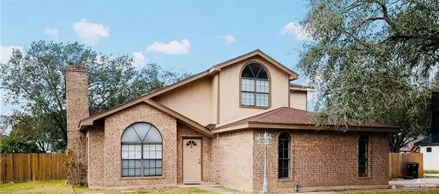 a house view with a outdoor space
