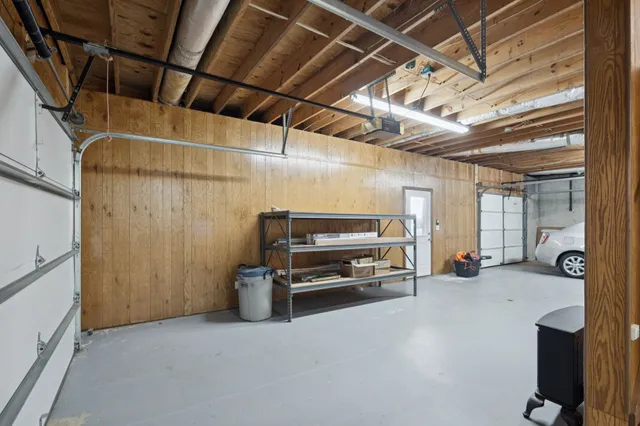 a view of a room with wooden furniture