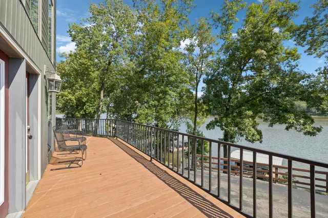 a view of a lake from a balcony