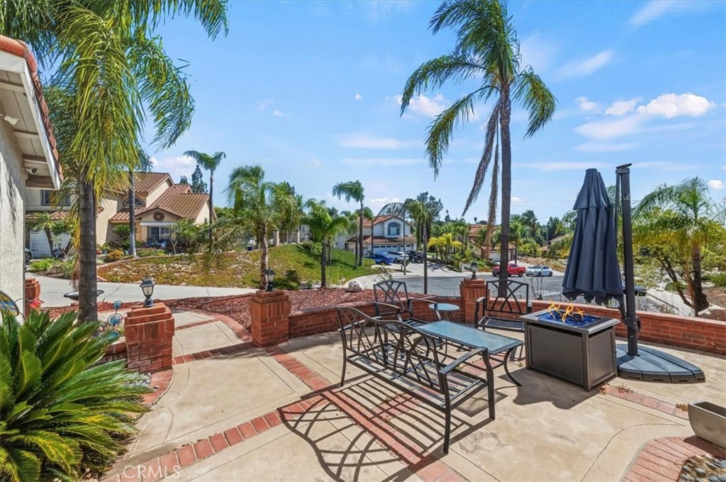 352 Leafwood Court Riverside, CA 92506 - Photo 4 of 42 a view of a backyard patio and swimming pool
