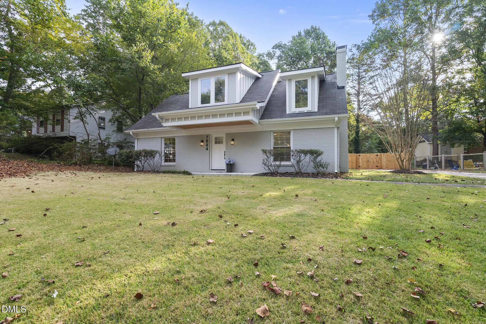 7804 Brandyapple Drive Raleigh, NC 27615 - Photo 2 of 58 a front view of a house with garden