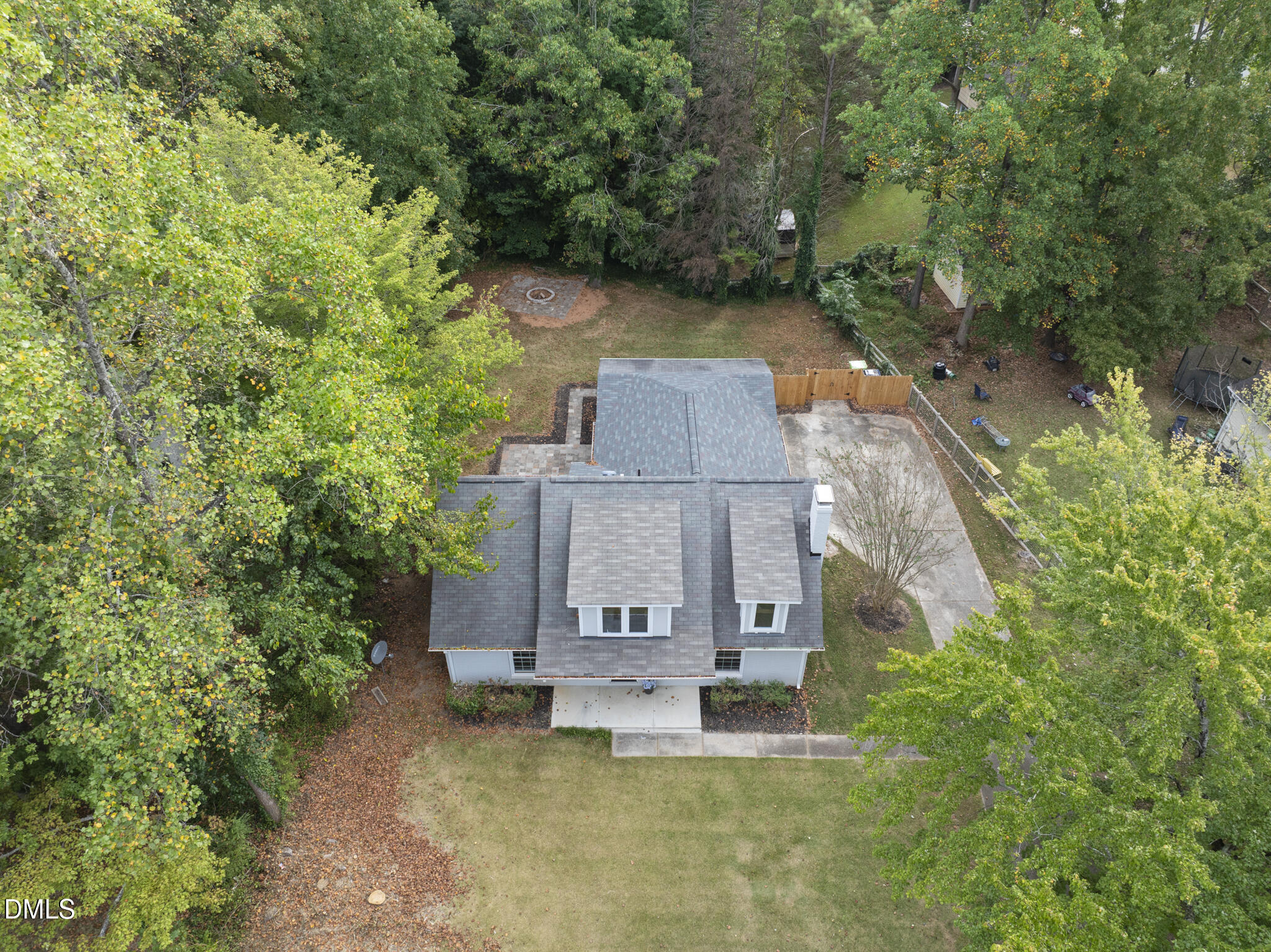 7804 Brandyapple Drive Raleigh, NC 27615 - Photo 40 of 58 an aerial view of a house with a yard swimming pool and outdoor seating