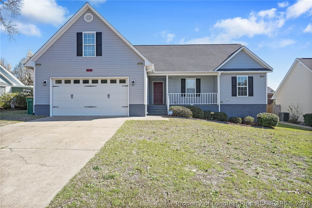 5353 Pringle Way Hope Mills, NC 28348 - Photo 2 of 29 a front view of a house with a yard