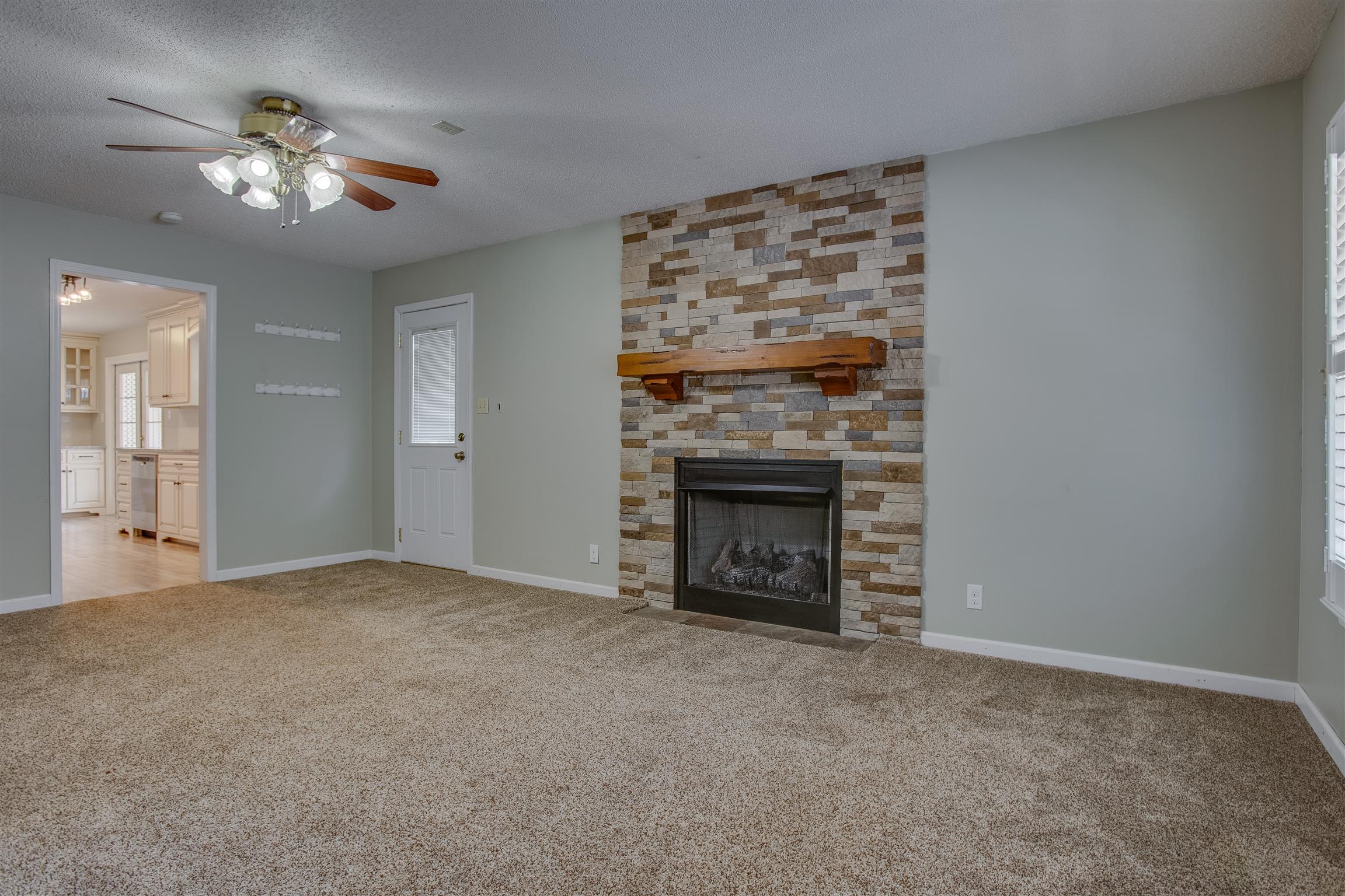 878 Tom Osborne Road Columbia, TN 38401 - Photo 11 of 26 View from other side of Family Room/Den. Conveniently located next to kitchen for snacks during movie time!