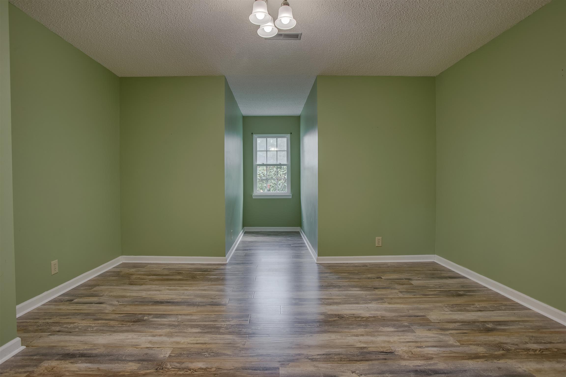 878 Tom Osborne Road Columbia, TN 38401 - Photo 17 of 26 Bedroom 2 on second level features Jack-n-Jill style bath with separate dressing/toilet areas and shared shower and closet in the middle