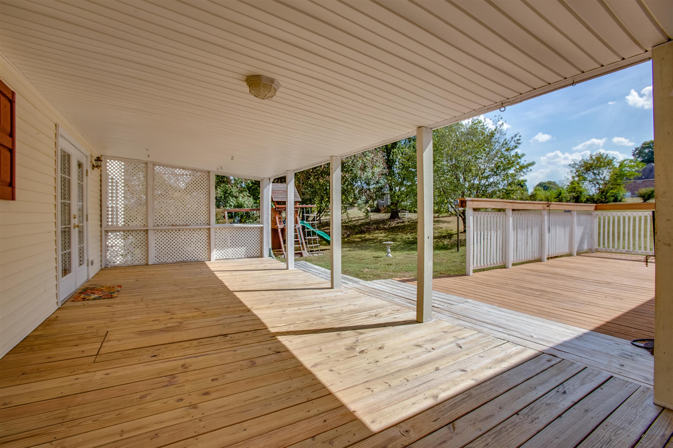 878 Tom Osborne Road Columbia, TN 38401 - Photo 22 of 26 THIS. DECK.... Imagine the entertaining, rain or shine! Or enjoy some evening relaxation while listening to the crickets chirp!