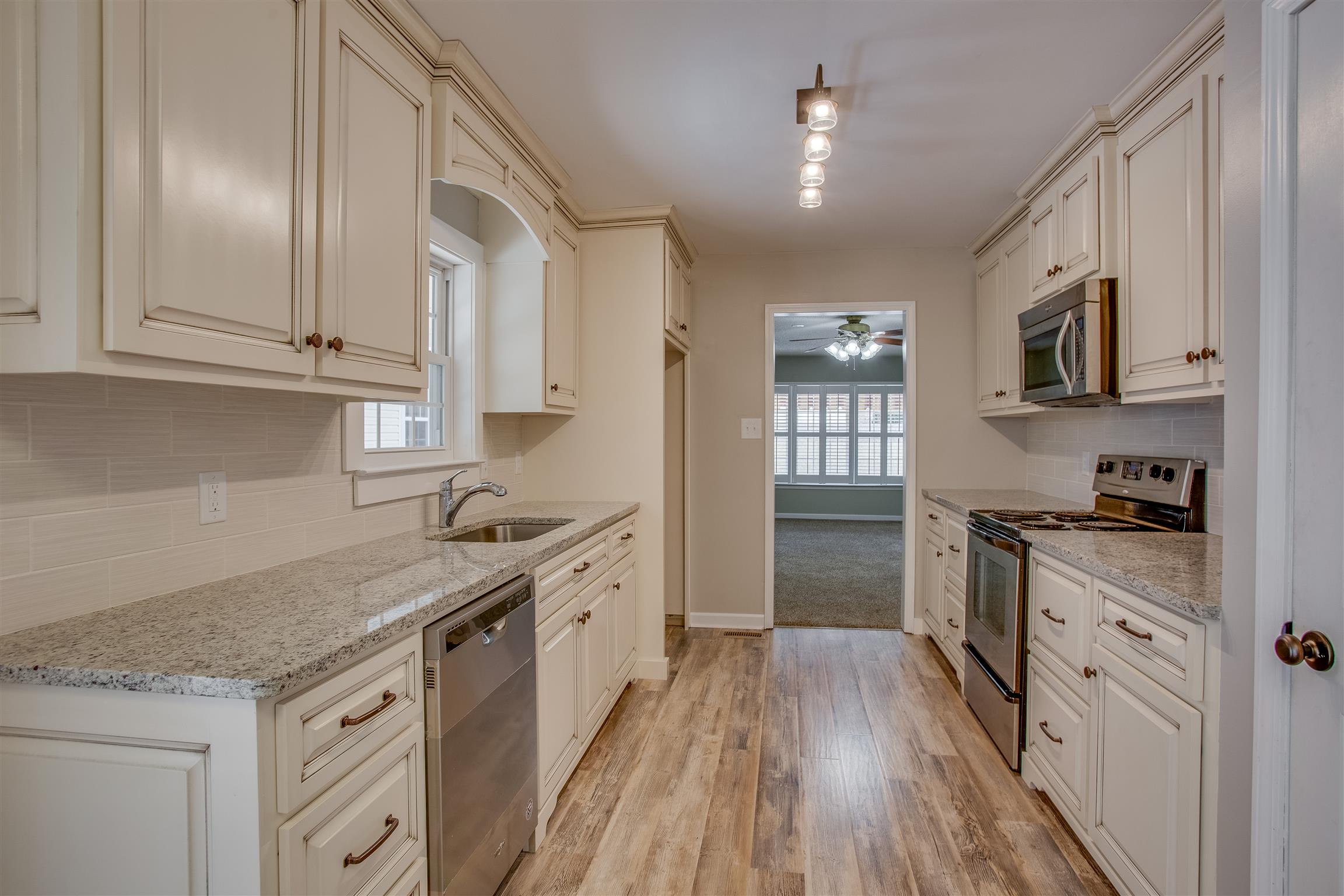 878 Tom Osborne Road Columbia, TN 38401 - Photo 8 of 26 Stainless appliances and plenty of space for family meal prepping!