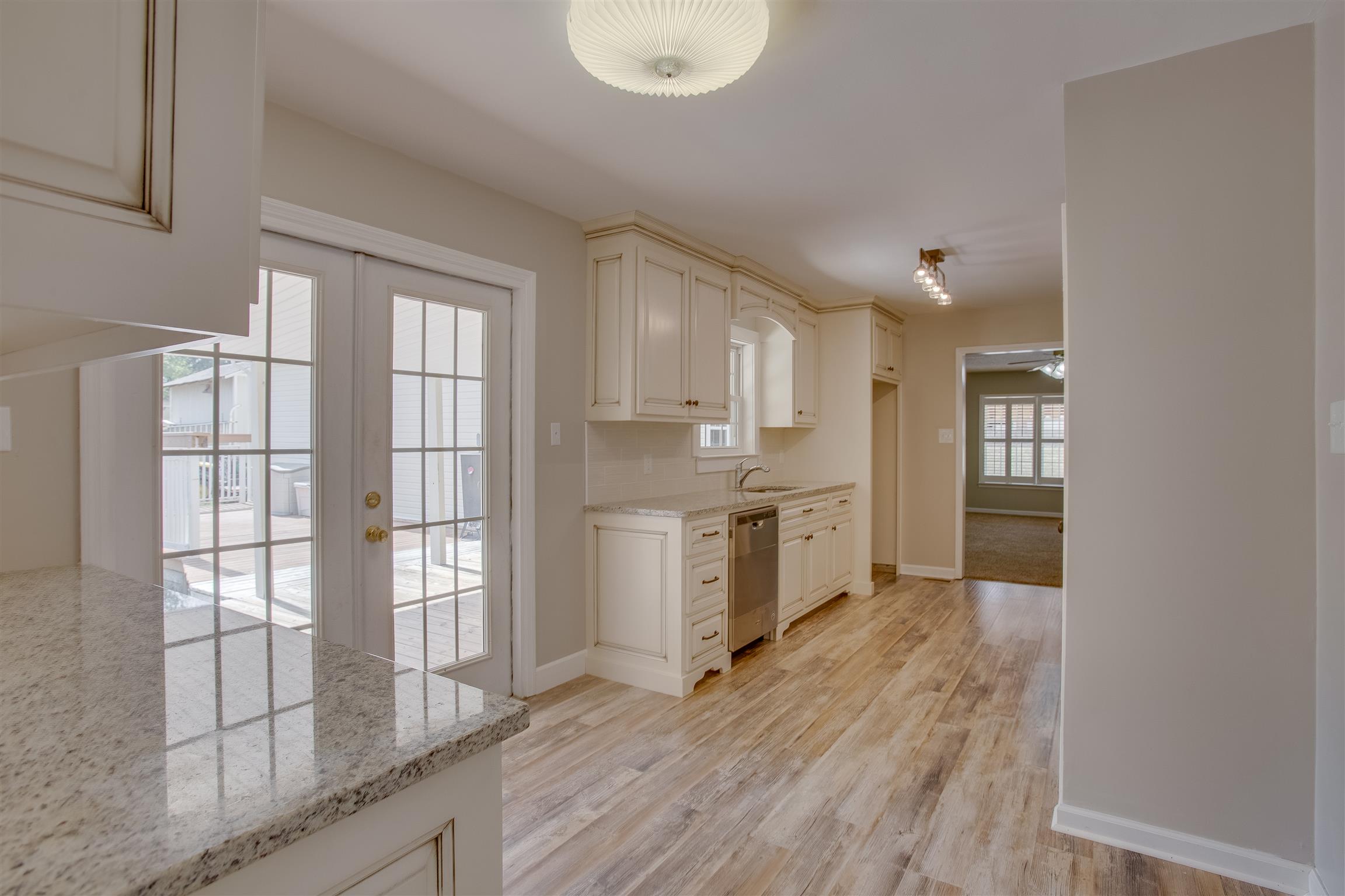 878 Tom Osborne Road Columbia, TN 38401 - Photo 9 of 26 Eat in area of kitchen with fabulous double doors out to your additional entertaining area. Just open them up to let the outside in!