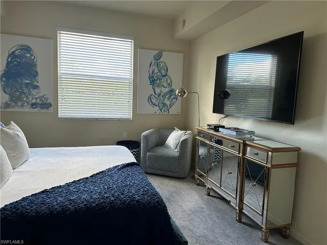 a bathroom with a sink vanity granite and a mirror