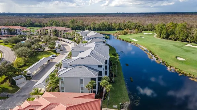 an aerial view of a house having yard