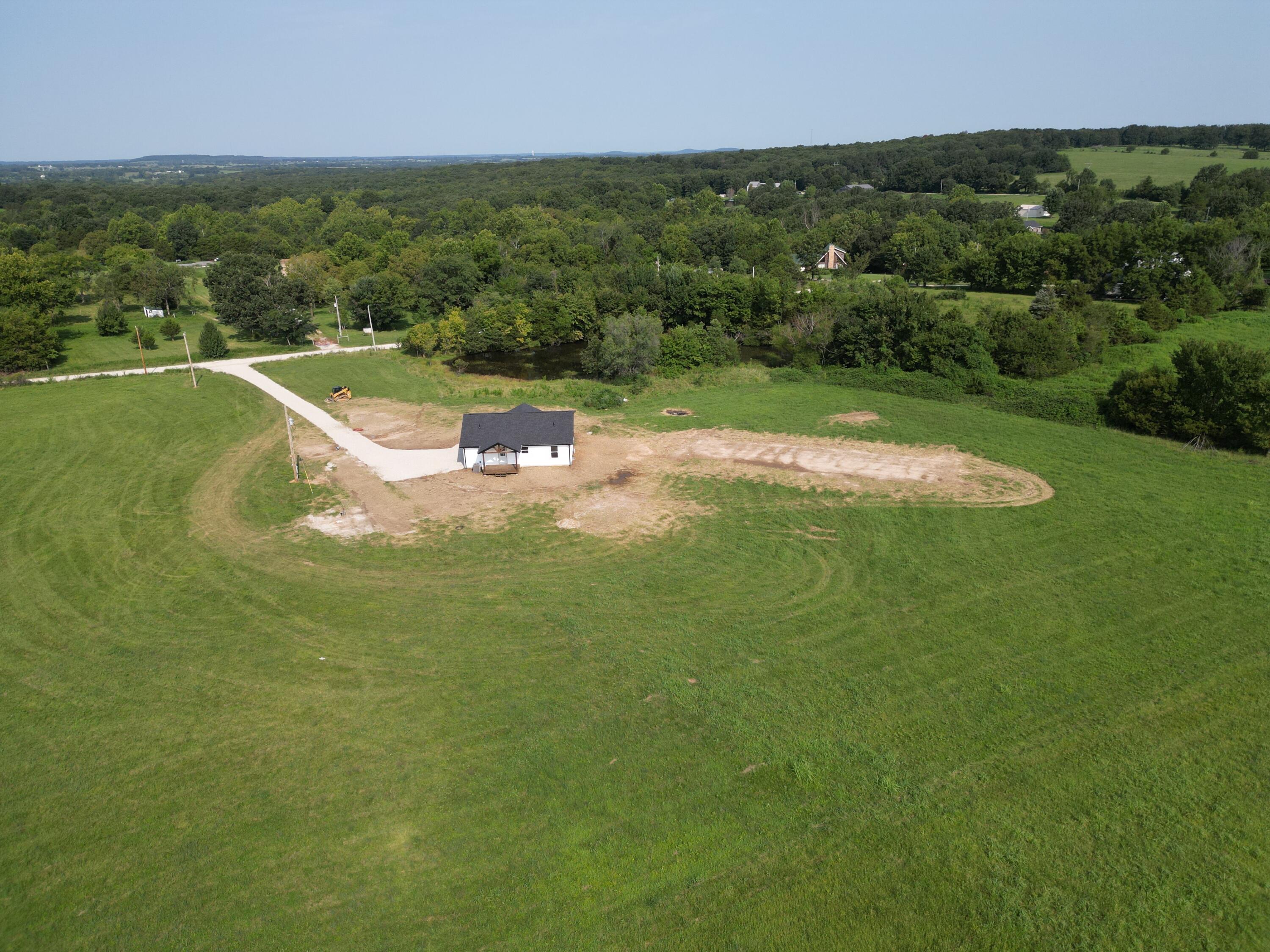 192 South Crossway Road Marshfield, MO 65706 - Photo 9 of 51 dji_fly_20260810_114054_278_178628837093