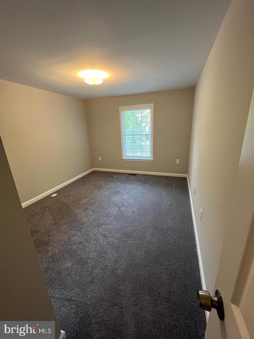 355 Crescendo Way Silver Spring, MD 20901 - Photo 11 of 23 an empty room with a window