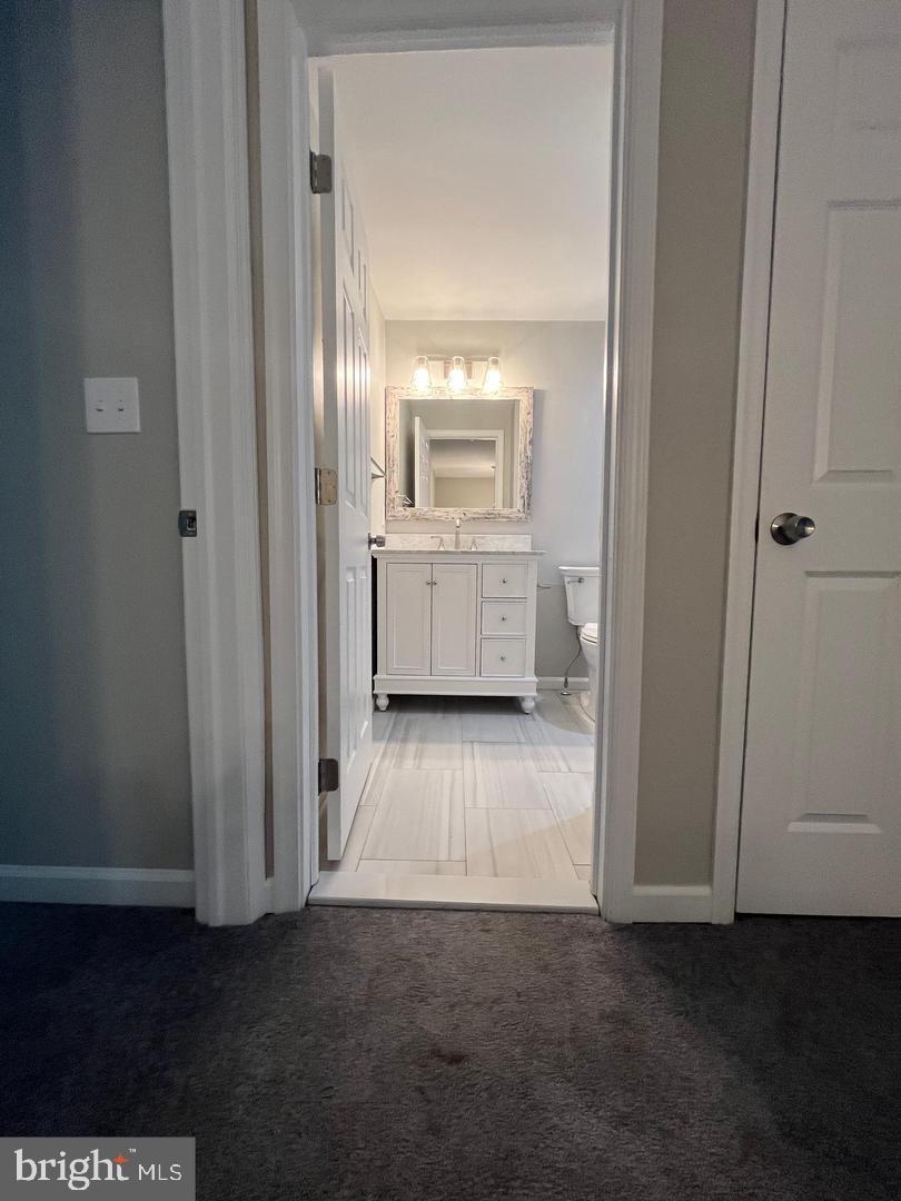 355 Crescendo Way Silver Spring, MD 20901 - Photo 6 of 23 a view of utility room with closet