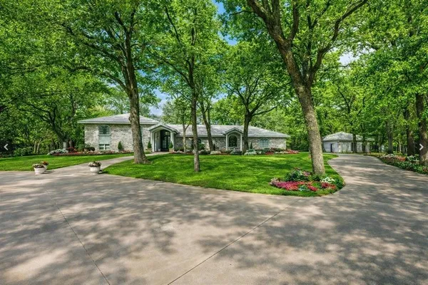 a house with lots of trees