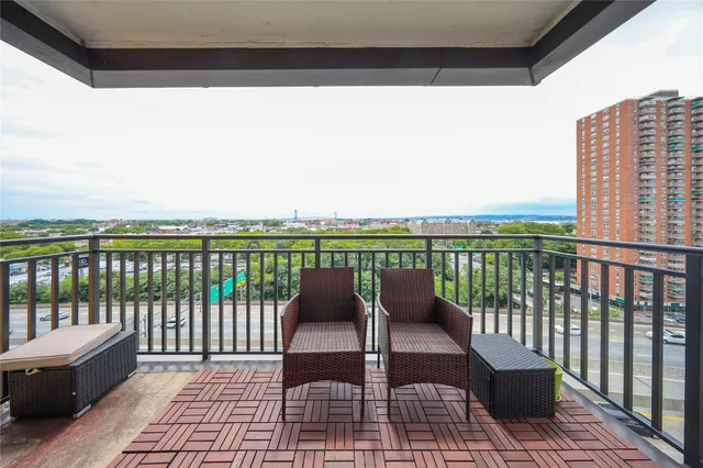 a view of a chairs on the roof deck