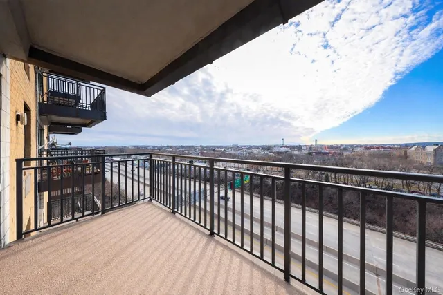 a view of balcony with furniture