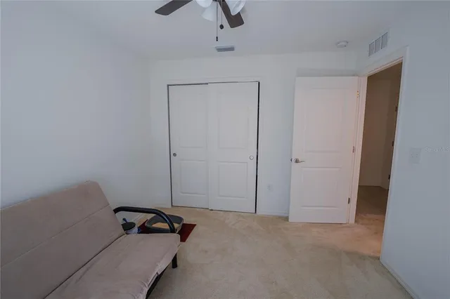 a room with furniture and a flat screen tv