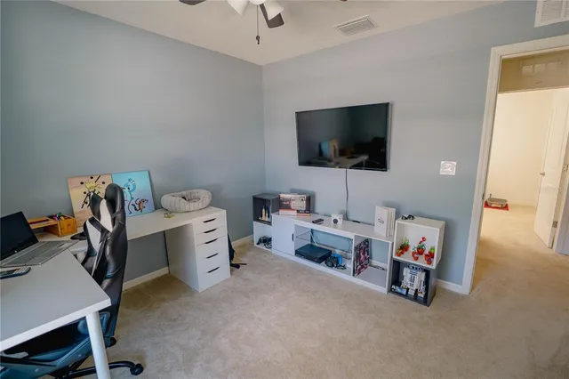 a bedroom with bed and a window