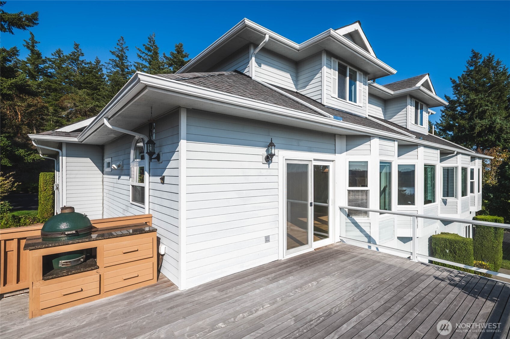 8661 Southridge Place Anacortes, WA 98221 - Photo 16 of 39 a front view of a house with a yard