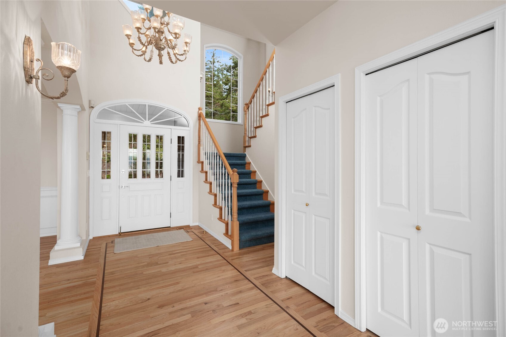 8661 Southridge Place Anacortes, WA 98221 - Photo 3 of 39 a view of entryway with stairs and wooden floor