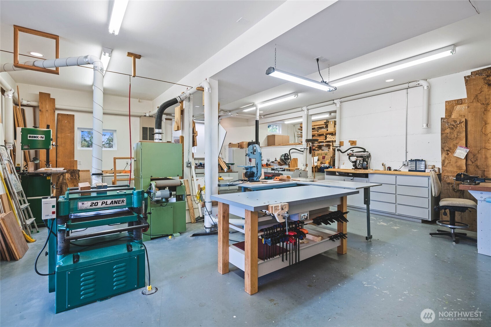 8661 Southridge Place Anacortes, WA 98221 - Photo 31 of 39 a living room with furniture and a flat screen tv
