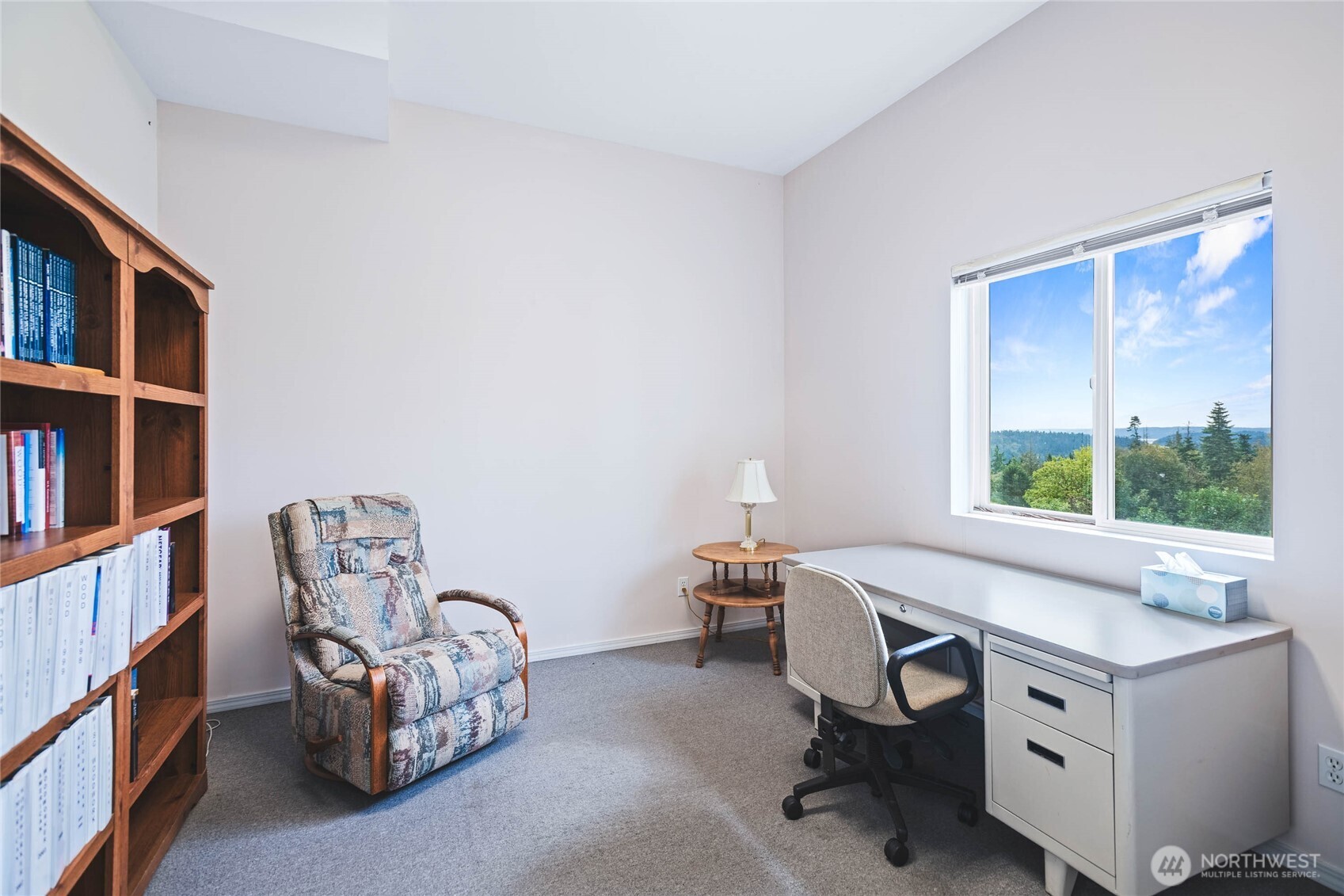 8661 Southridge Place Anacortes, WA 98221 - Photo 32 of 39 a view of a workspace with furniture and a window