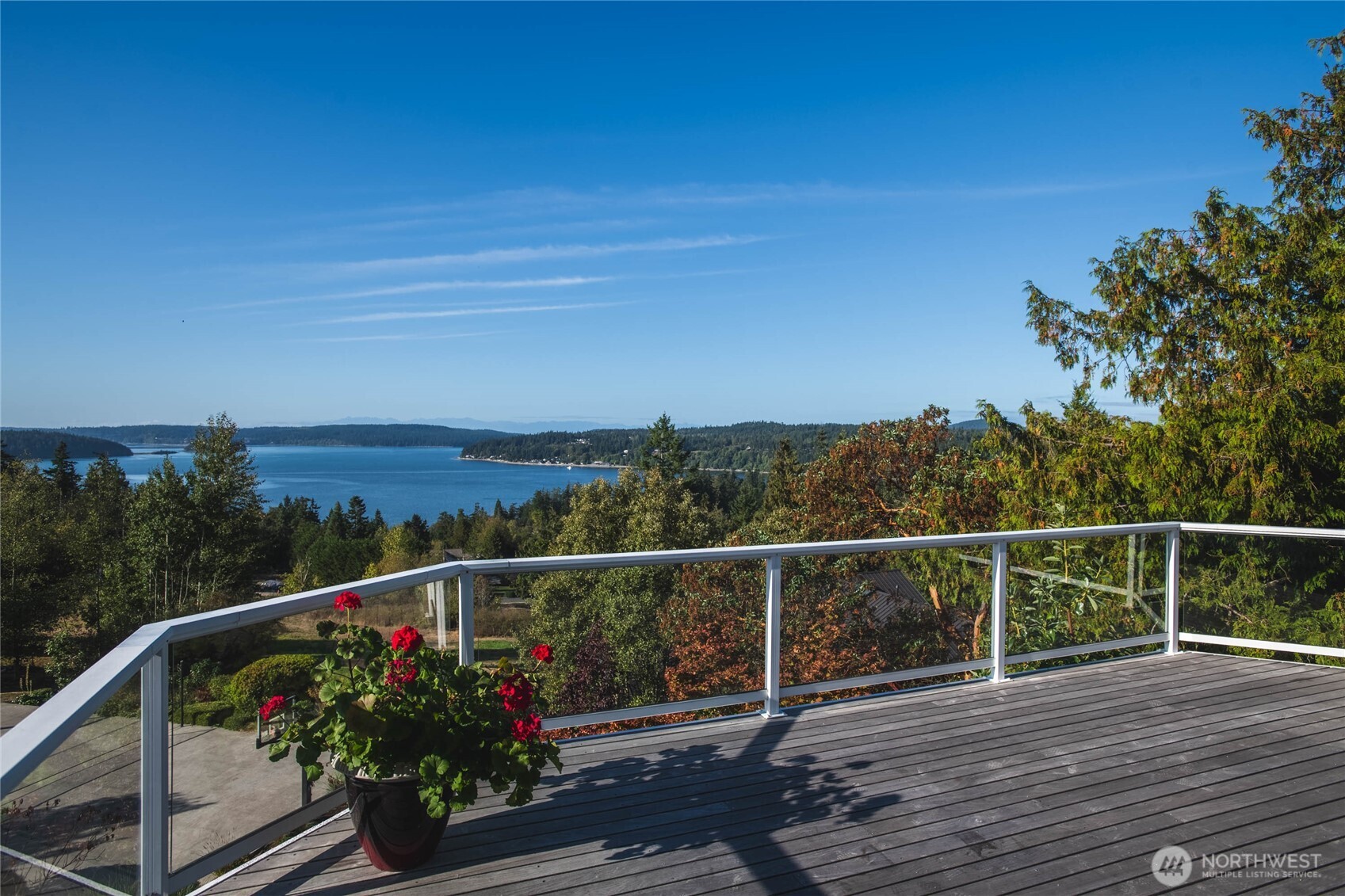 8661 Southridge Place Anacortes, WA 98221 - Photo 33 of 39 a view of a balcony with wooden floor and fence