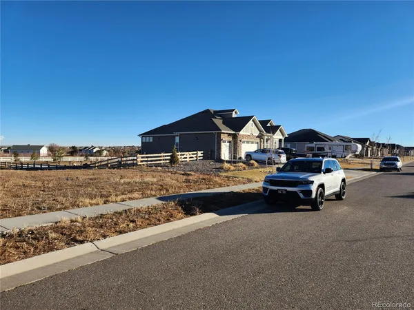 a car parked in front of a house