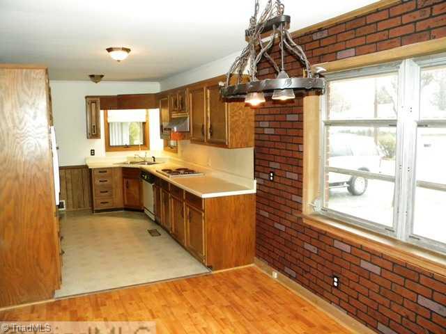 205 North Street Rural Hall, NC 27045 - Photo 7 of 16 Kitchen. Kitchen and adjacent dining room