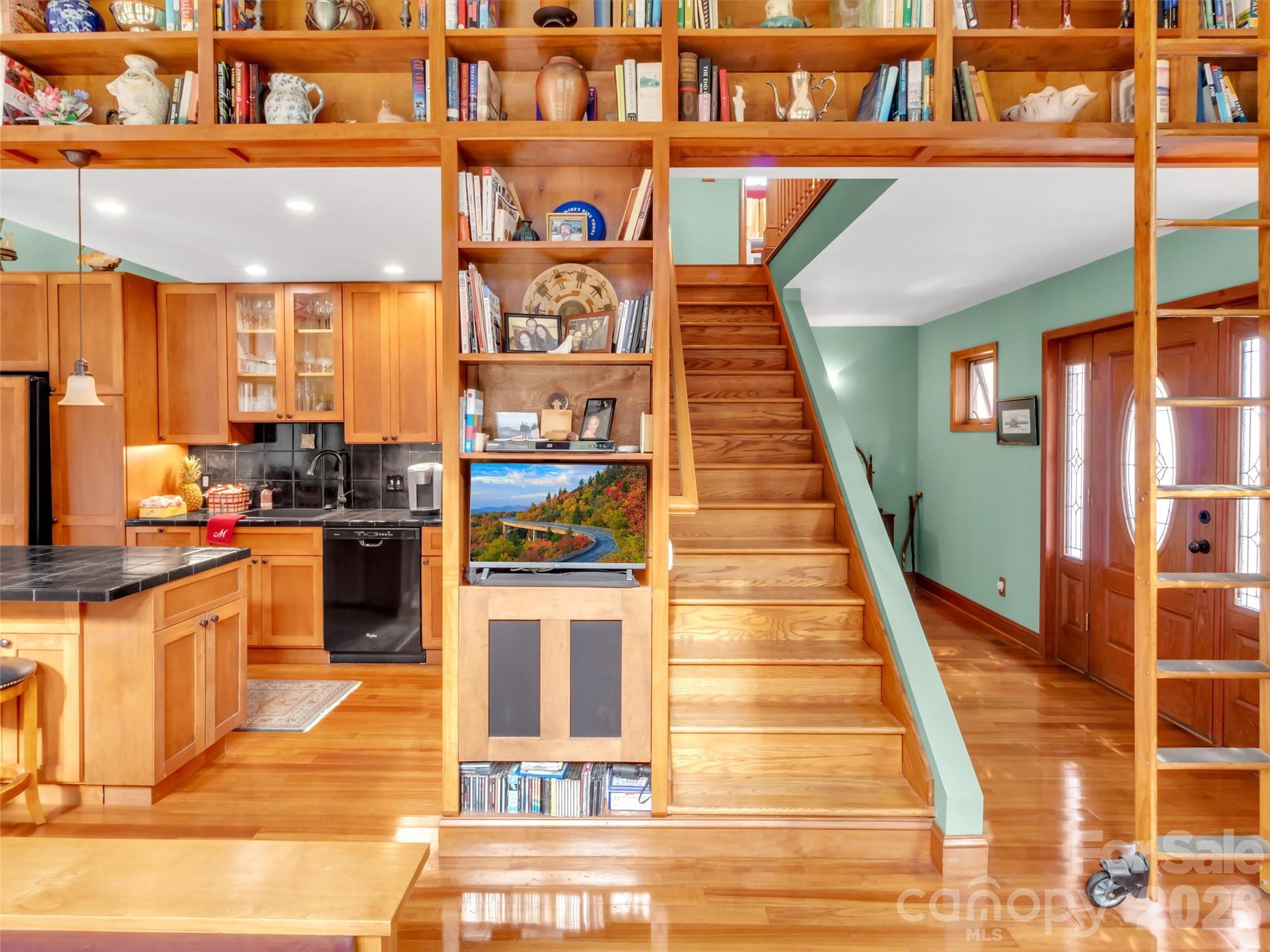 1201 Cathey Cove Road Waynesville, NC 28786 - Photo 17 of 48 a very nice looking room with many windows
