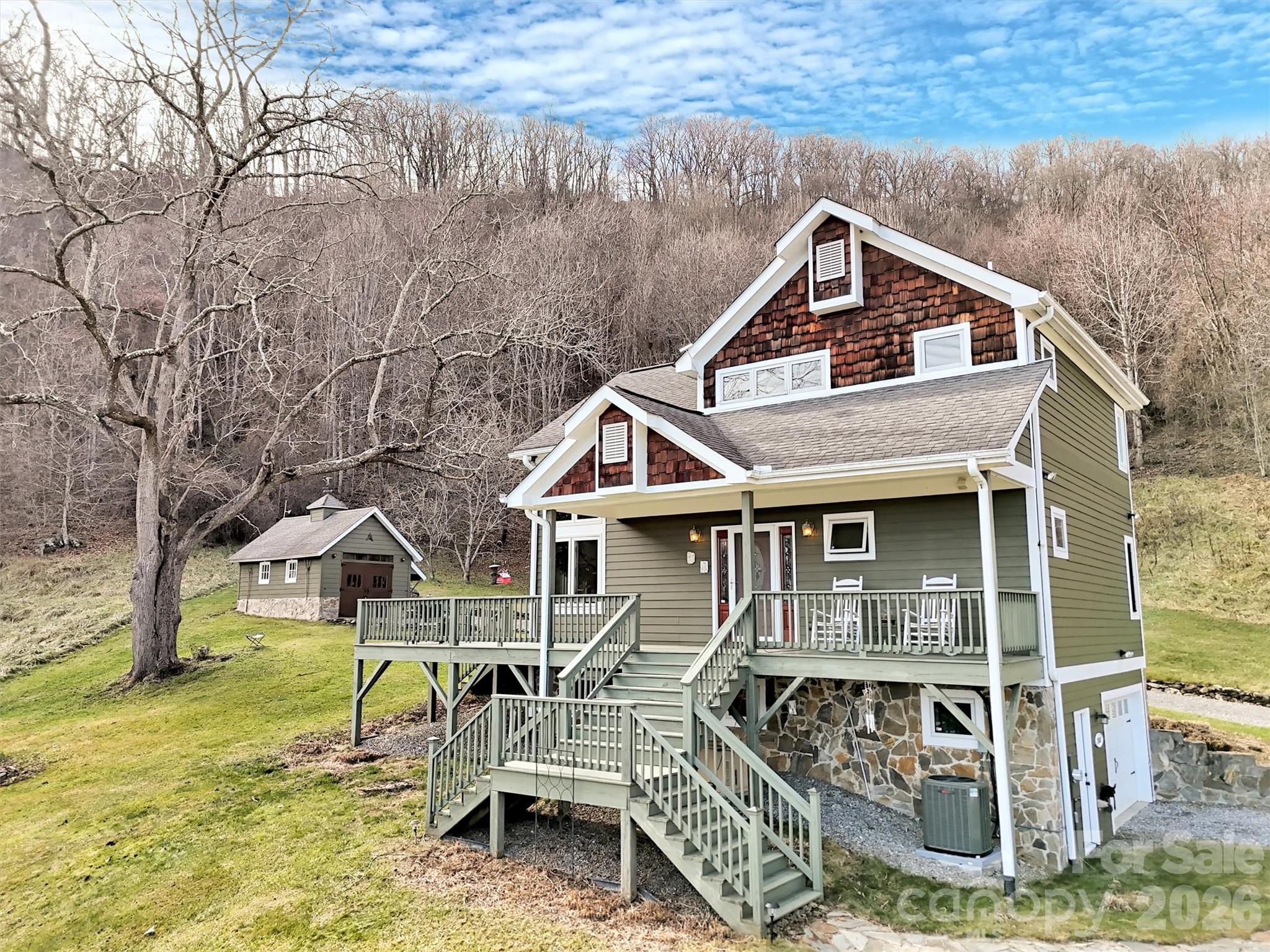 1201 Cathey Cove Road Waynesville, NC 28786 - Photo 46 of 48 a house with trees in front of it