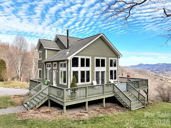 a view of a porch with wooden floor