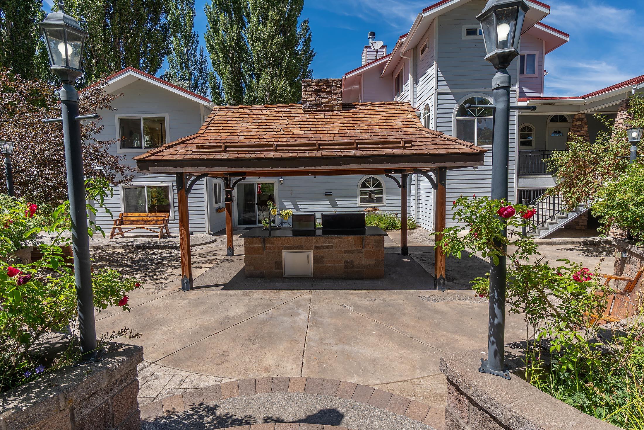 59047 Old Lake Road Christmas Valley, OR 97641 - Photo 7 of 55 Covered back yard outdoor kitchen