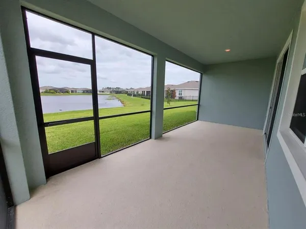 a view of a garden from a balcony